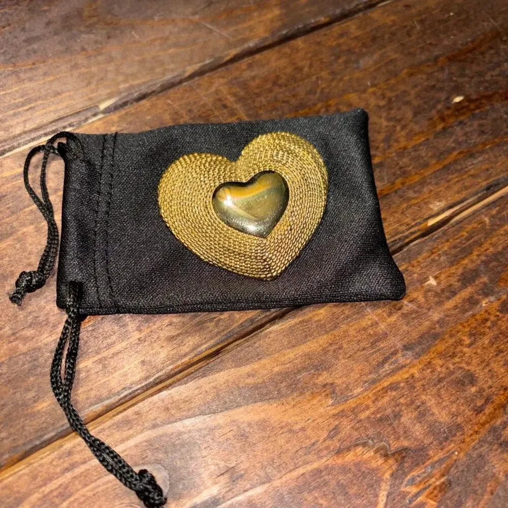 New gold heart brooch with textured surface